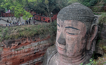 Chinese experts mull major restoration of world's largest stone Buddha statue