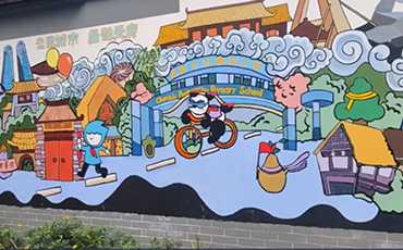 Chengdu pupils paint wall with colorful designs