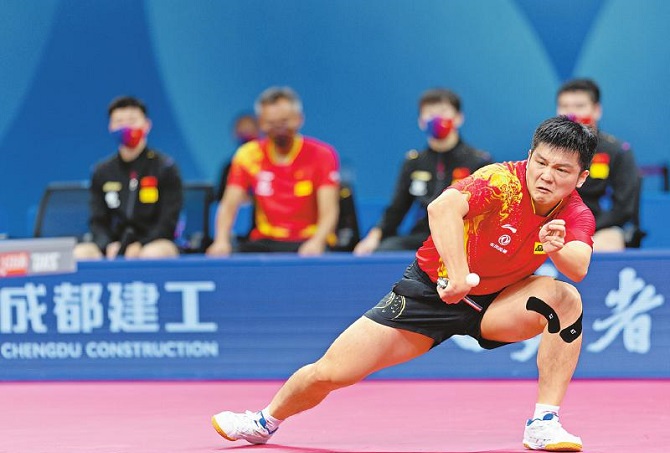 中国男女乒双双提前一轮晋级淘汰赛
